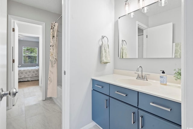 6703 Jefferson Pl Unit B7, Myrtle Beach, SC 29572 - bathroom with vanity, shower / bath combo, marble look tiles, and ensuite bathroom