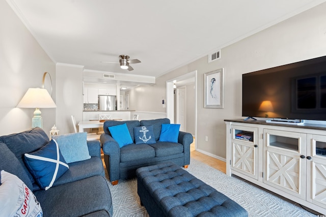 208 Ocean Blvd N Unit 226, North Myrtle Beach, SC 29582 - living room with crown molding, ceiling fan, and light tile patterned floors
