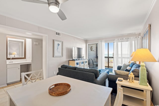 208 Ocean Blvd N Unit 226, North Myrtle Beach, SC 29582 - dining space featuring a ceiling fan, crown molding, and light tile patterned floors