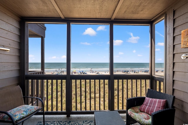 208 Ocean Blvd N Unit 226, North Myrtle Beach, SC 29582 - sunroom with view of water and beach