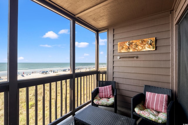 208 Ocean Blvd N Unit 226, North Myrtle Beach, SC 29582 - sunroom with view of water and beach