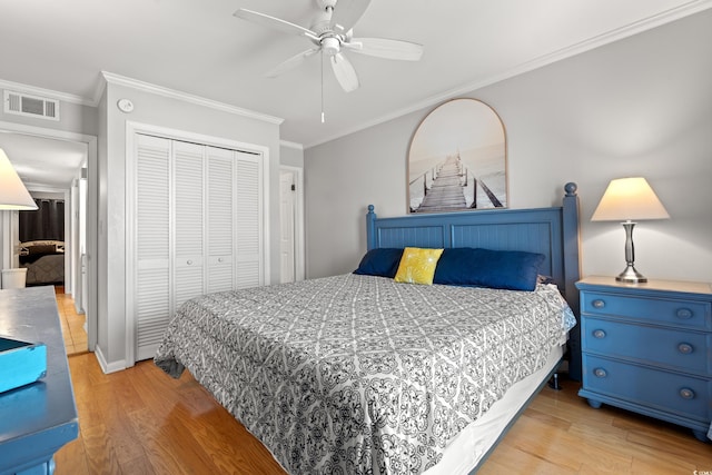 208 Ocean Blvd N Unit 226, North Myrtle Beach, SC 29582 - bedroom with a closet, wood finished floors, crown molding, and ceiling fan