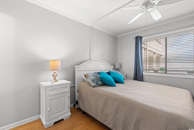 208 Ocean Blvd N Unit 226, North Myrtle Beach, SC 29582 - bedroom featuring crown molding, light wood-style floors, and a ceiling fan
