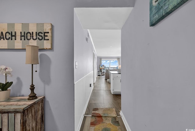 1310 N Waccamaw Dr Unit 208, Garden City Beach, SC 29576 - corridor with wainscoting and wood finished floors