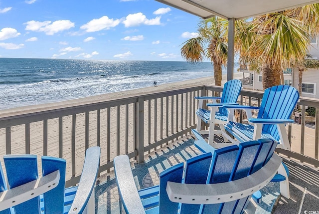 1310 N Waccamaw Dr Unit 208, Garden City Beach, SC 29576 - wooden deck with view of water and beach