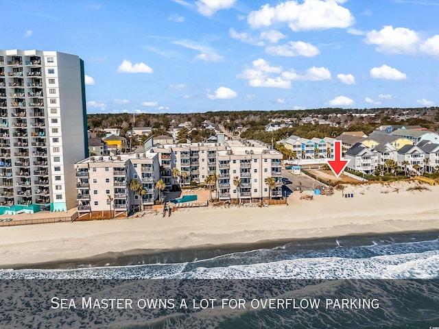 1310 N Waccamaw Dr Unit 208, Garden City Beach, SC 29576 - bird's eye view of apartment complex and extended coastline