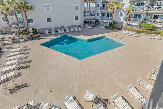 1310 N Waccamaw Dr Unit 208, Garden City Beach, SC 29576 - community pool featuring a patio