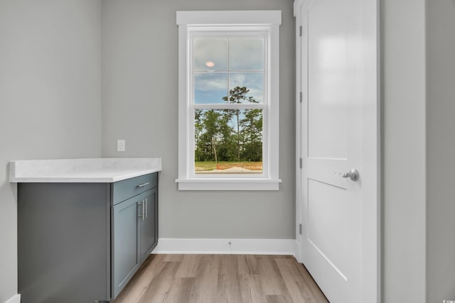 1545 Coastal Cove Ln, Calabash, NC 28467 - bathroom featuring wood finished floors, baseboards, and vanity