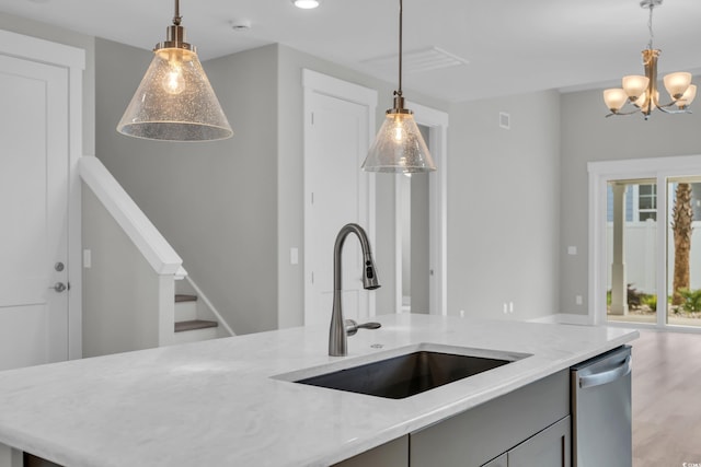 1545 Coastal Cove Ln, Calabash, NC 28467 - kitchen with dishwasher, a sink, light stone counters, pendant lighting, and recessed lighting