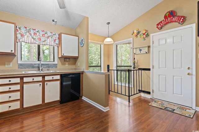 752 Tall Oaks Ct, Myrtle Beach, SC 29588 - kitchen with dishwasher, a sink, white cabinetry, dark wood-style floors, and light countertops