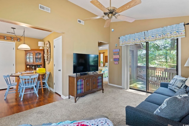 752 Tall Oaks Ct, Myrtle Beach, SC 29588 - carpeted living room with baseboards, vaulted ceiling, and ceiling fan