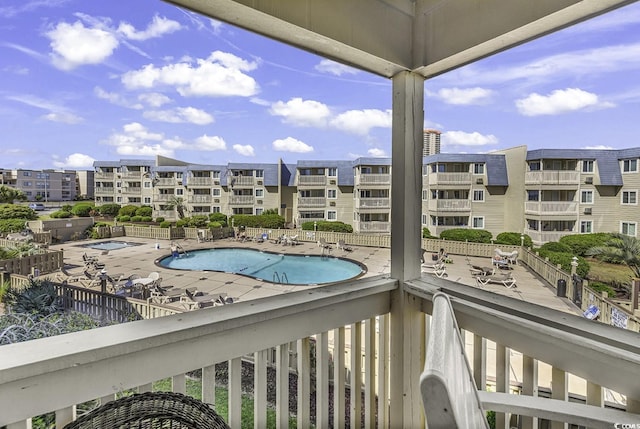 9660 Shore Dr Unit 208, Myrtle Beach, SC 29572 - balcony featuring view of pool area and a patio