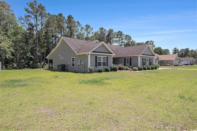 95 Timber Run Dr, Georgetown, SC 29440 - view of front facade with a front lawn and roof with shingles