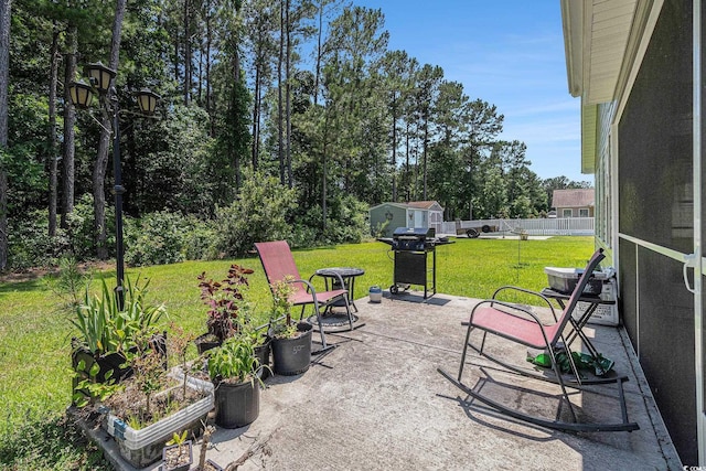 95 Timber Run Dr, Georgetown, SC 29440 - view of patio with a grill and a storage shed