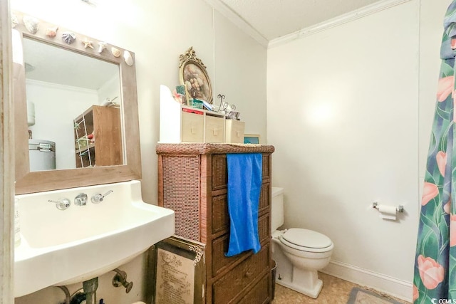 404 13th Ave S, Myrtle Beach, SC 29577 - bathroom with ornamental molding, toilet, a sink, tile patterned floors, and a shower with shower curtain