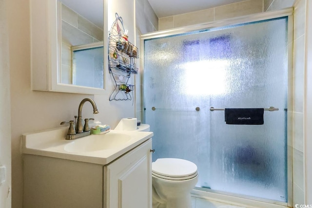 404 13th Ave S, Myrtle Beach, SC 29577 - bathroom with vanity, a shower stall, and toilet
