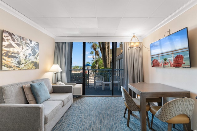 1105 S Ocean Blvd Unit 110, Myrtle Beach, SC 29577 - living room featuring expansive windows, a paneled ceiling, ornamental molding, and a chandelier