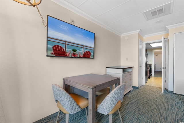 1105 S Ocean Blvd Unit 110, Myrtle Beach, SC 29577 - dining space featuring crown molding and carpet floors