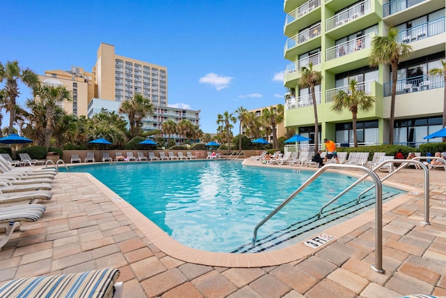 1105 S Ocean Blvd Unit 110, Myrtle Beach, SC 29577 - community pool with a patio