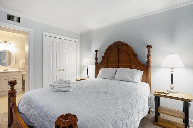 5905 S Kings Hwy Unit A518, Myrtle Beach, SC 29575 - carpeted bedroom with ornamental molding, a sink, a closet, and ensuite bathroom