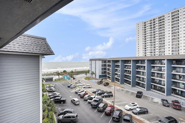 5905 S Kings Hwy Unit A518, Myrtle Beach, SC 29575 - view of apartment building / complex featuring a water view and uncovered parking