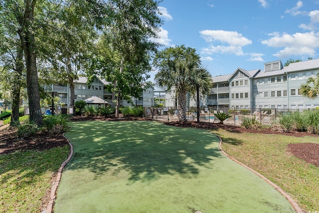 5905 S Kings Hwy Unit A518, Myrtle Beach, SC 29575 - view of home's community featuring an area to practice putting and a residential view