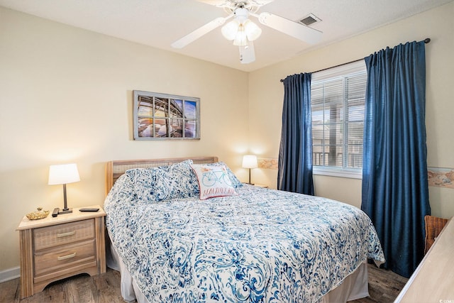 1900 Duffy St Unit H-8, North Myrtle Beach, SC 29582 - bedroom with wood finished floors, baseboards, and a ceiling fan