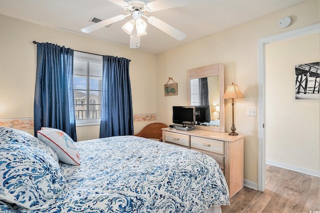 1900 Duffy St Unit H-8, North Myrtle Beach, SC 29582 - bedroom featuring light wood-style floors and ceiling fan