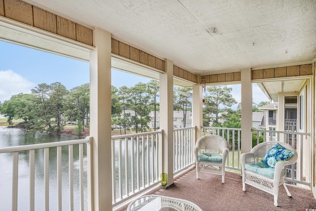 1900 Duffy St Unit H-8, North Myrtle Beach, SC 29582 - sunroom / solarium featuring a water view