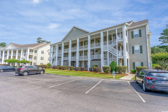 5852 Longwood Dr Unit 302, Murrells Inlet, SC 29576 - view of apartment building / complex with uncovered parking