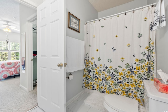 5852 Longwood Dr Unit 302, Murrells Inlet, SC 29576 - bathroom featuring toilet, a ceiling fan, baseboards, and ensuite bath