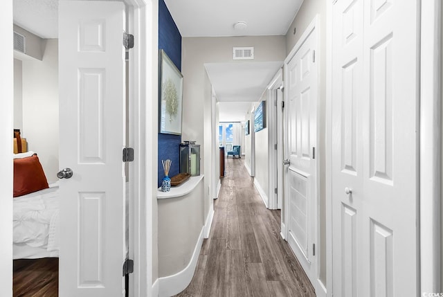 2500 N Ocean Blvd Unit 1102, Myrtle Beach, SC 29577 - corridor with dark wood-style floors and baseboards