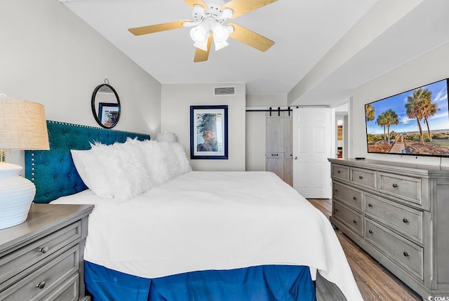 2500 N Ocean Blvd Unit 1102, Myrtle Beach, SC 29577 - bedroom with wood finished floors and a ceiling fan