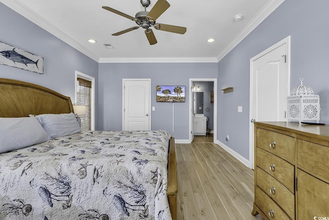 113-A Vista Dr, Garden City Beach, SC 29576 - bedroom with baseboards, light wood-style flooring, ornamental molding, recessed lighting, and ensuite bathroom