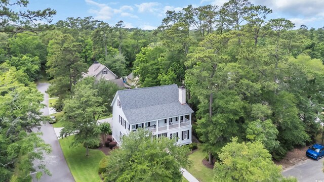 9 Winnowing Way, Pawleys Island, SC 29585 - aerial view of property and surrounding area featuring a heavily wooded area