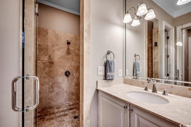 9 Winnowing Way, Pawleys Island, SC 29585 - bathroom with a stall shower, vanity, and crown molding