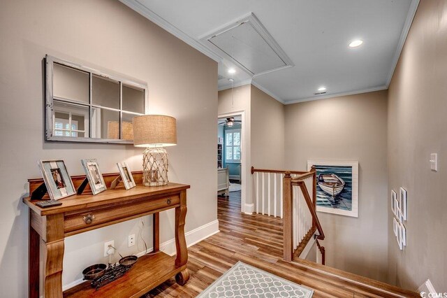 9 Winnowing Way, Pawleys Island, SC 29585 - hallway with attic access, an upstairs landing, crown molding, wood finished floors, and baseboards