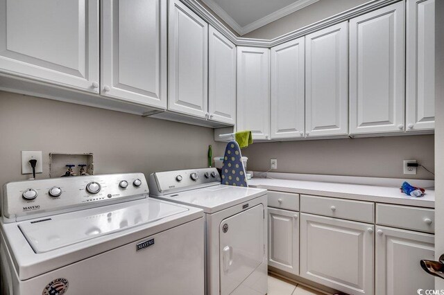 9 Winnowing Way, Pawleys Island, SC 29585 - washroom featuring washing machine and clothes dryer, cabinet space, and ornamental molding