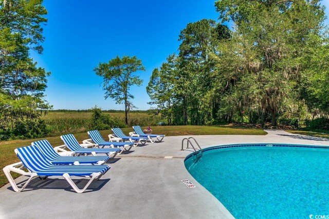 9 Winnowing Way, Pawleys Island, SC 29585 - community pool with a patio area