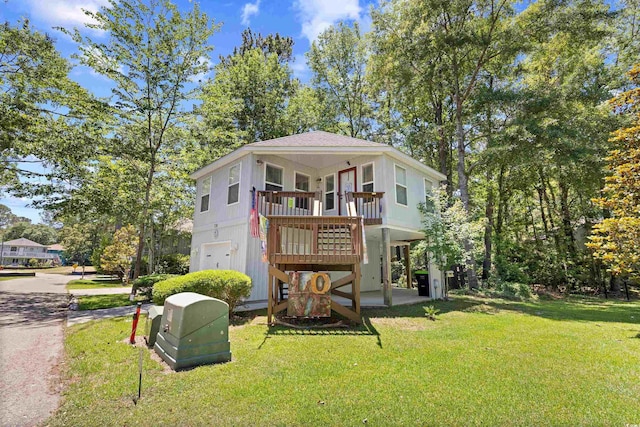 739 Tall Oaks Dr, Myrtle Beach, SC 29588 - view of front facade with a front yard and a deck