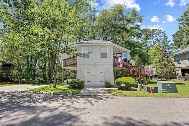 739 Tall Oaks Dr, Myrtle Beach, SC 29588 - view of front of property featuring stairs, driveway, and a garage