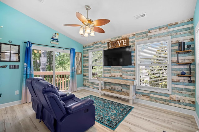 739 Tall Oaks Dr, Myrtle Beach, SC 29588 - living area featuring baseboards, ceiling fan, vaulted ceiling, wood finished floors, and wallpapered walls