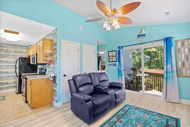 739 Tall Oaks Dr, Myrtle Beach, SC 29588 - living area featuring a ceiling fan, baseboards, and light wood-type flooring