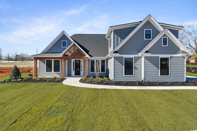2729 Long Ave, Conway, SC 29526 - view of front facade with board and batten siding and a front lawn