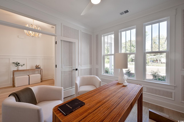 2729 Long Ave, Conway, SC 29526 - office area with a decorative wall, wood finished floors, a ceiling fan, and a chandelier