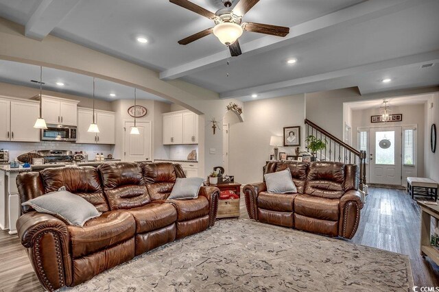 3091 Viceroy Loop, Little River, SC 29566 - living room featuring beamed ceiling, wood finished floors, ceiling fan, recessed lighting, and stairway