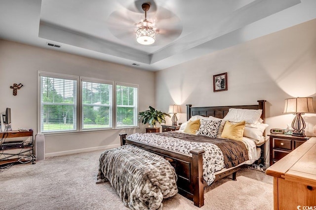 3091 Viceroy Loop, Little River, SC 29566 - carpeted bedroom featuring a tray ceiling, baseboards, and ceiling fan