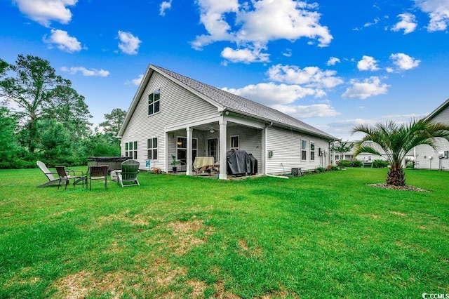 3091 Viceroy Loop, Little River, SC 29566 - rear view of property featuring a lawn