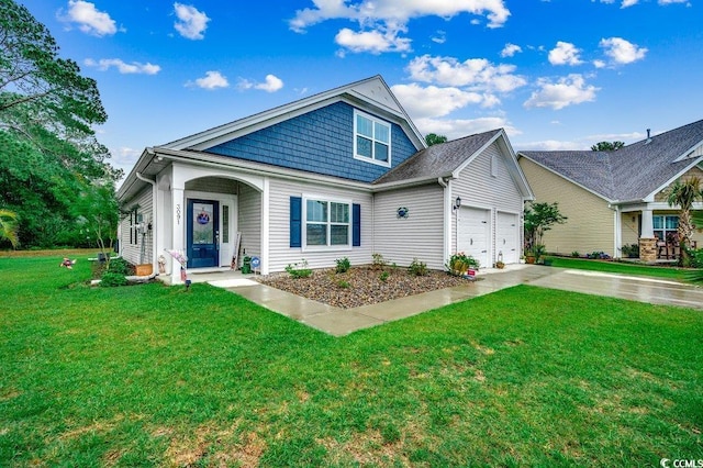 3091 Viceroy Loop, Little River, SC 29566 - view of front of home with a front yard, an attached garage, and concrete driveway
