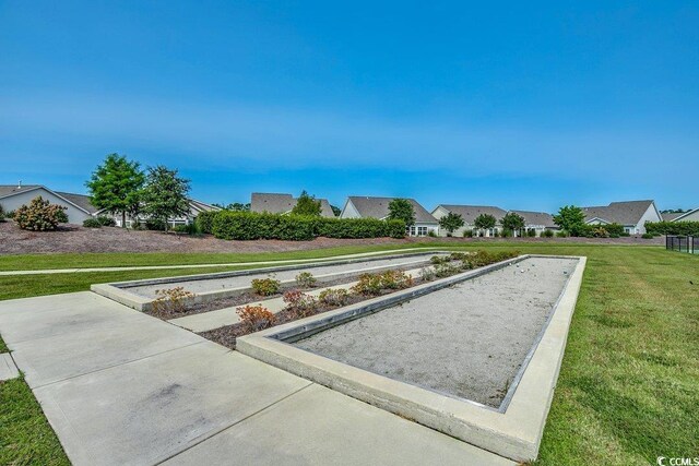 3091 Viceroy Loop, Little River, SC 29566 - view of community with a game area, a yard, and a residential view